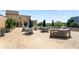 The community patio offers a swimming pool, dining area, outdoor kitchen, and lounging space at 201 W Ponce De Leon Ave # 515, Decatur, GA 30030