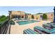 The community pool features a shallow end, chaise lounges, and umbrellas for relaxed outdoor enjoyment at 201 W Ponce De Leon Ave # 515, Decatur, GA 30030