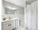 Bathroom with white tile and white shower curtain at 3501 Emperor Way, Tucker, GA 30084