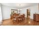 Elegant dining room features hardwood floors and ample space for Gathering gatherings at 3501 Emperor Way, Tucker, GA 30084