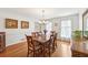 Beautiful dining room featuring hardwood floors, natural light and classic decor at 3501 Emperor Way, Tucker, GA 30084