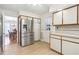 Bright eat-in kitchen offers stainless steel appliances and access to the dining area at 3501 Emperor Way, Tucker, GA 30084