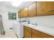 Convenient laundry room with a utility sink and ample storage space at 3501 Emperor Way, Tucker, GA 30084