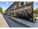Brick building with a large 'Welcome to Inman Park' mural at 870 Inman Village Pkwy # 203, Atlanta, GA 30307