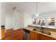 Modern kitchen features granite countertops, stainless steel appliances, and hardwood floors at 870 Inman Village Pkwy # 203, Atlanta, GA 30307