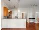 Modern kitchen with wood cabinets, granite countertops, and stainless steel appliances at 870 Inman Village Pkwy # 203, Atlanta, GA 30307