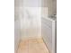 Bright laundry area featuring tile floor and modern washer and dryer units at 870 Inman Village Pkwy # 203, Atlanta, GA 30307