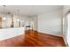 Spacious living room with hardwood floors opens to a modern kitchen, great for entertaining at 870 Inman Village Pkwy # 203, Atlanta, GA 30307