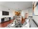 Stylish living room with adjacent kitchen and hardwood floors, and modern decor at 870 Inman Village Pkwy # 203, Atlanta, GA 30307