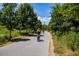Enjoy a leisurely stroll on the community walking path surrounded by nature at 870 Inman Village Pkwy # 203, Atlanta, GA 30307