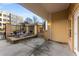View of a private patio area enclosed by a decorative black iron fence at 870 Inman Village Pkwy # 203, Atlanta, GA 30307