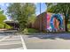Street view of a building with a mural featuring a portrait of a Personal at 870 Inman Village Pkwy # 203, Atlanta, GA 30307