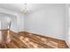 Inviting dining area featuring hardwood floors, modern lighting and natural light at 115 Benfield Cir, Cartersville, GA 30121