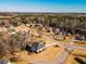 Aerial view of neighborhood with tree-lined streets and beautiful homes at 118 Jasmine Way, Carrollton, GA 30180