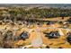Expansive aerial view of a neighborhood featuring well-maintained homes and lush trees at 118 Jasmine Way, Carrollton, GA 30180