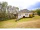 Well-maintained backyard with mature landscaping at 118 Jasmine Way, Carrollton, GA 30180