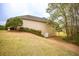 View of the home's backyard showing the back entrance at 118 Jasmine Way, Carrollton, GA 30180