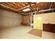 Spacious unfinished basement featuring exposed beams, concrete walls and floors, and open spaces at 118 Jasmine Way, Carrollton, GA 30180