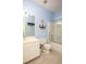 Nautical themed bathroom with vanity sink, tub with shower and decorative anchor art at 118 Jasmine Way, Carrollton, GA 30180