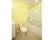 Clean bathroom featuring tiled floors, a toilet, a shower with glass doors, and a vanity at 118 Jasmine Way, Carrollton, GA 30180