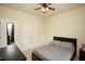 Neutral bedroom featuring minimal decor and a standard closet at 118 Jasmine Way, Carrollton, GA 30180