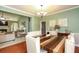 Open dining room flows into living space for easy entertaining and enjoyment at 118 Jasmine Way, Carrollton, GA 30180
