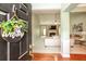 Inviting foyer leads to a living room with fireplace and hardwood floors at 118 Jasmine Way, Carrollton, GA 30180