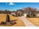Charming home with a well-manicured front yard and long driveway at 118 Jasmine Way, Carrollton, GA 30180