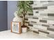 Stylish tile backsplash complements the kitchen's quartz countertops at 118 Jasmine Way, Carrollton, GA 30180