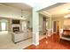 Open-concept living room with fireplace, modern decor, and great natural light at 118 Jasmine Way, Carrollton, GA 30180