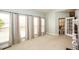 Bright living room with natural light streaming through the large windows, fireplace at 118 Jasmine Way, Carrollton, GA 30180