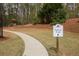 A 'Little Vine' Nature Trail sign marking the beginning of a winding path surrounded by greenery at 118 Jasmine Way, Carrollton, GA 30180