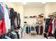 Walk-in closet featuring an extensive clothing rack and shelving for organization at 118 Jasmine Way, Carrollton, GA 30180