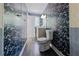 Charming bathroom showcases unique patterned wallpaper, modern fixtures, and a tiled shower space at 2221 Meadow Wood Ct, Marietta, GA 30062