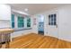 Bright dining area features a bay window, built-in seating, and an adjacent door leading to laundry at 2221 Meadow Wood Ct, Marietta, GA 30062