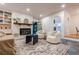 Bright living room featuring a fireplace, built-in shelving, and elegant furnishings at 2221 Meadow Wood Ct, Marietta, GA 30062