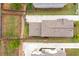 Aerial view features the property's roof, long driveway, and a well-defined, fenced backyard space at 2342 Terrace View Sw Cir, Atlanta, GA 30315