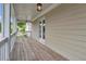 Spacious balcony with a wooden floor, offering scenic views and access to the outdoors at 2342 Terrace View Sw Cir, Atlanta, GA 30315
