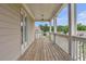Relaxing outdoor balcony with wooden deck and views of the surrounding neighborhood at 2342 Terrace View Sw Cir, Atlanta, GA 30315
