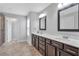 Bathroom featuring granite countertops, modern lighting, and tile flooring, offering style and functionality at 2342 Terrace View Sw Cir, Atlanta, GA 30315