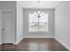 Dining room with a modern chandelier and large window at 2342 Terrace View Sw Cir, Atlanta, GA 30315