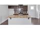 Kitchen island with stainless steel sink and granite countertops at 2342 Terrace View Sw Cir, Atlanta, GA 30315