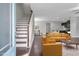Bright and airy living room featuring hardwood floors and an open staircase at 2342 Terrace View Sw Cir, Atlanta, GA 30315