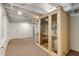 Finished basement highlighting a sauna for relaxation, with exposed ceiling elements at 1865 Briarlake Cir, Decatur, GA 30033