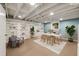 Finished basement transformed into a stylish office space, complete with bookshelves and modern decor at 1865 Briarlake Cir, Decatur, GA 30033