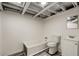 Clean and simple bathroom with a tub and shower combination, white cabinets, and wood-look flooring at 1865 Briarlake Cir, Decatur, GA 30033
