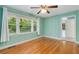 Bedroom with wood floors, and large window at 1865 Briarlake Cir, Decatur, GA 30033