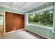Bedroom with large window with view of backyard at 1865 Briarlake Cir, Decatur, GA 30033