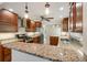 Updated kitchen featuring granite countertops, stainless steel appliances, and wood cabinetry at 1865 Briarlake Cir, Decatur, GA 30033