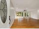 Bright and spacious living room featuring hardwood floors and multiple doors to the outdoor deck at 1865 Briarlake Cir, Decatur, GA 30033
